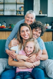 Family hugging together