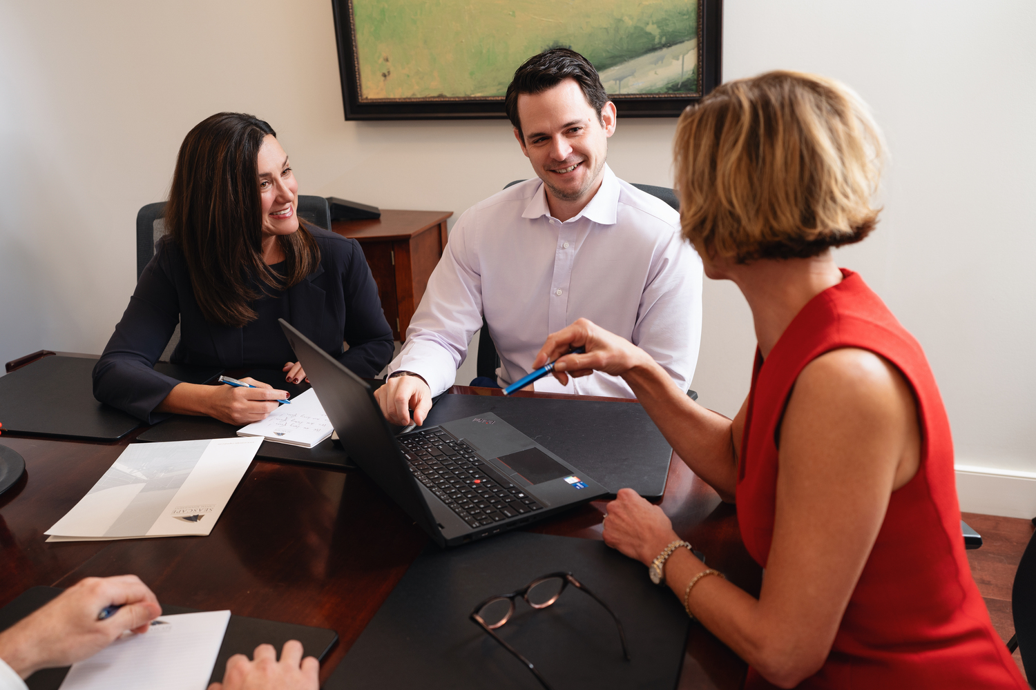 Seascape Capital Management team in discussion