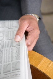 Man holding newspaper